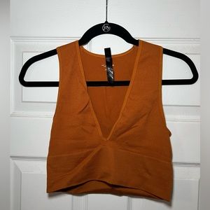 Urban Outfitters 
Out from Under Hailey Seamless Knit Plunge Bra Top